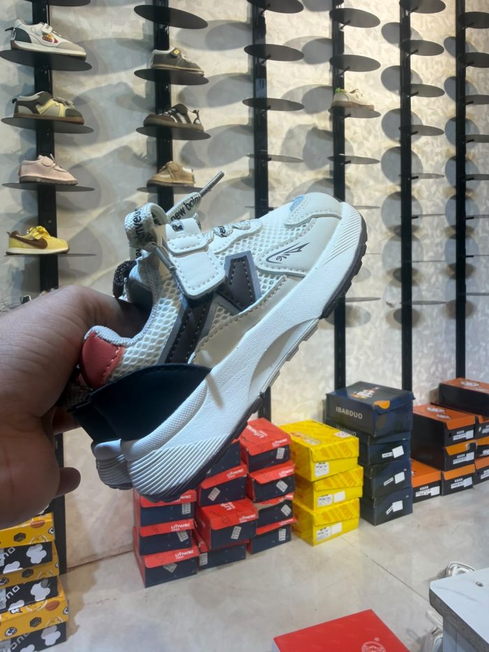 Kids’ Signature Footwear. 52A815 (COFFEE & ORANGE)